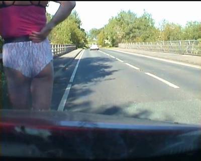 Amateur crossdresser in lingerie on a road - tubous.com