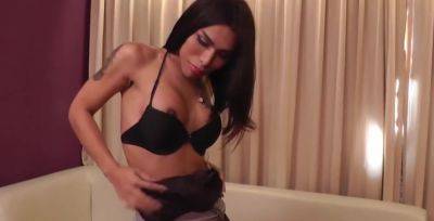 Tanned Ladyboy in Black Lingerie Plays with her Big Tits - hotmovs.com